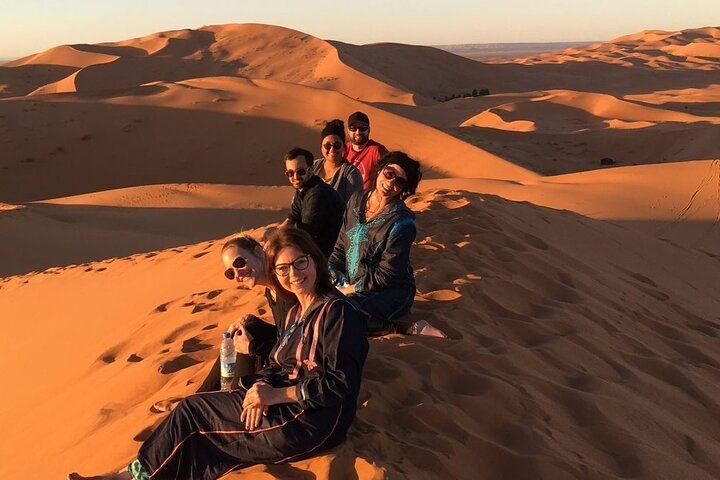 Experience the stunning dunes of Dubai as you enjoy camel rides sandboarding and a delightful BBQ dinner surrounded by captivating landscapes and rich cultural performances under the desert sky.